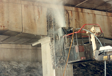 Hydraulic demolition of T-beam concrete of viaduct